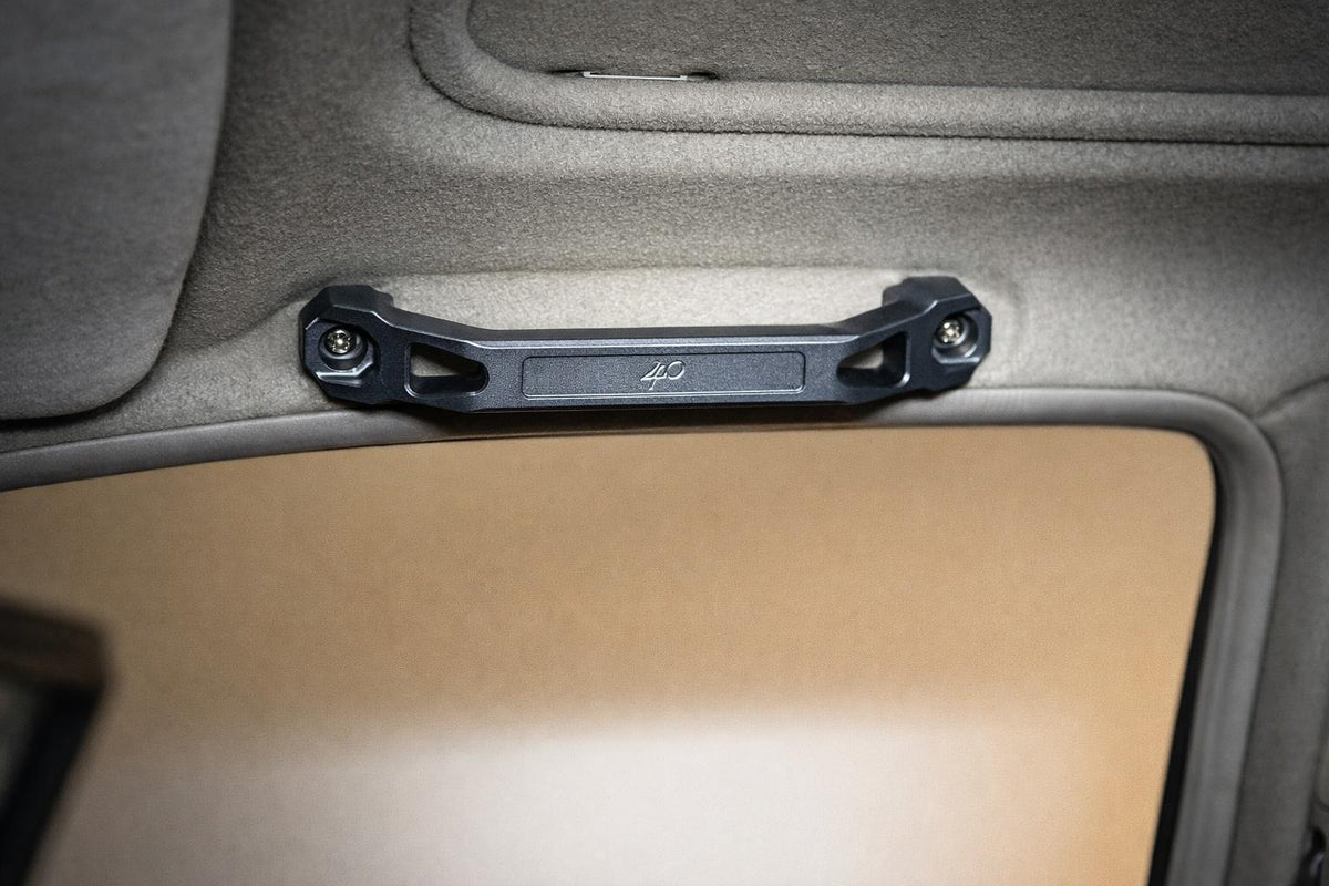 Installed Signal Grey overhead billet grab handle with 40th Anniversary engraving.